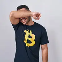 Anonymous casino guy with BTC t-shirt