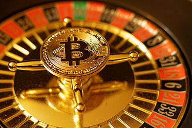 Bitcoin Gamble on Roulette table